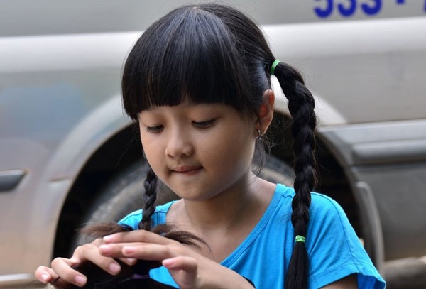 Diễn viên nhí Thanh Mỹ vai Minh Thu lúc nhỏ.