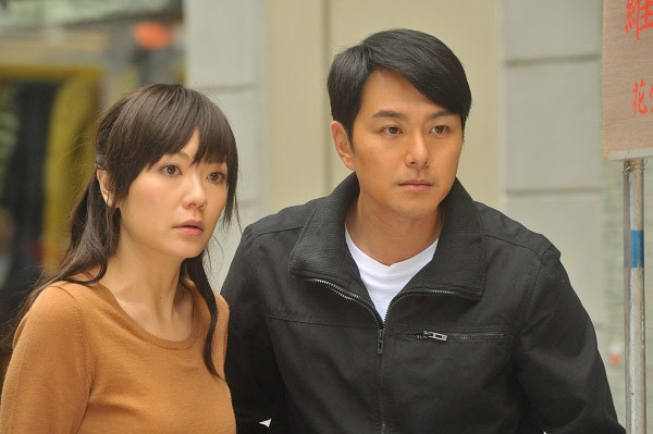 Với Tiêu Chính Nam trong phim Cự luân.