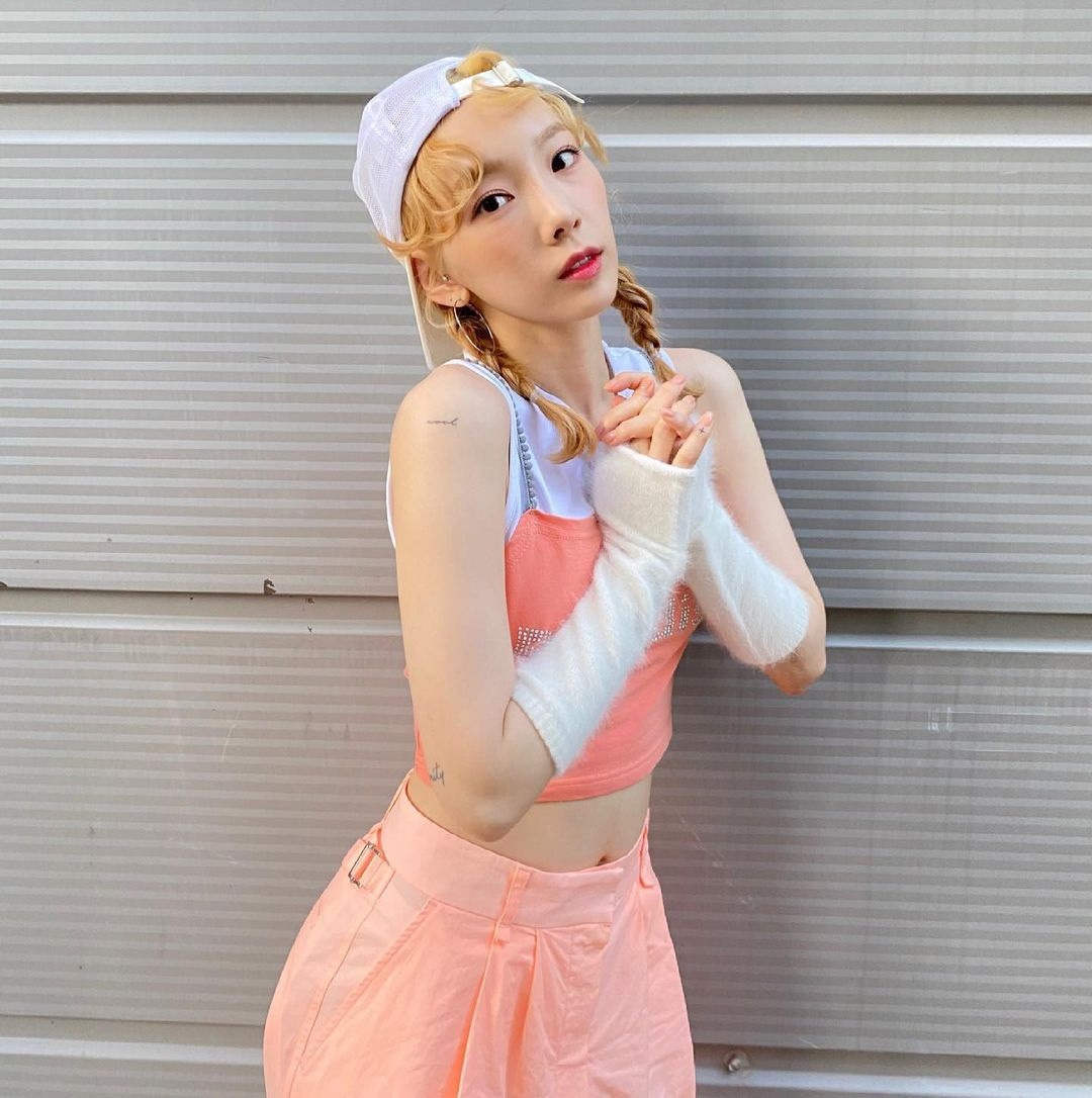 Taeyeon khoe eo thon anh 1