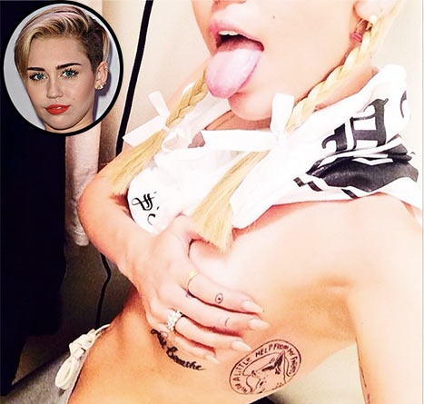 Miley Cyrus khoe hình xăm mới có in hình chú cún đã mất.