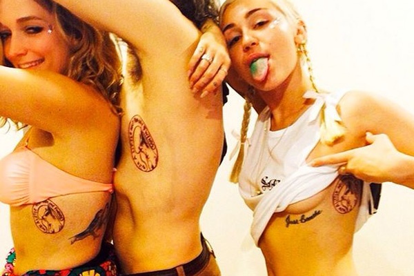 Miley Cyrus xam hinh cun cung len nguoi hinh anh