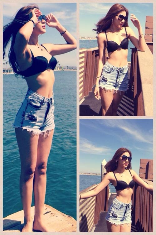 Kim Dung khoe đường cong và chân dài trên biển.