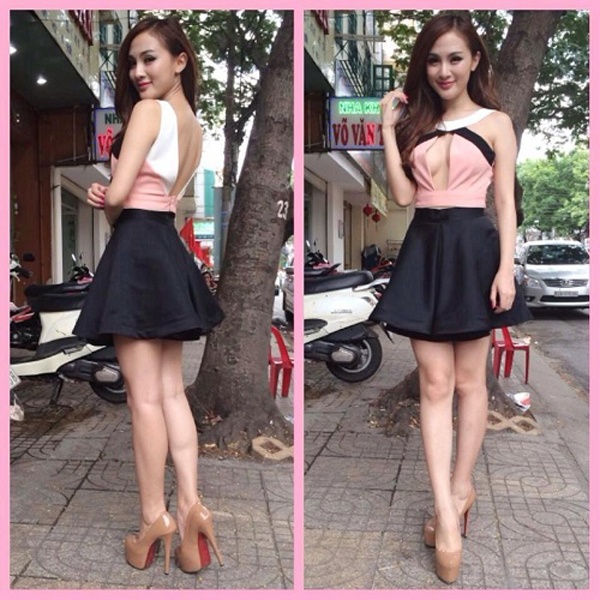 Hot girl Kelly không chỉ gây hút mắt bằng bộ váy xẻ ngực táo bạo mà còn từ đôi giày nude đế đỏ có chiều cao khoảng 20 cm giúp “kéo dài” đôi chân người đẹp.