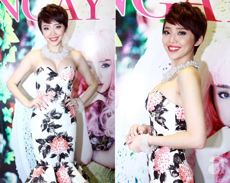 Tại buổi giới thiệu MV mới Ngày mai hôm 6/2, Tóc Tiên thu hút mọi ống kính khi cô diện bộ váy ngắn họa tiết in hoa, ôm sát lấy thân hình làm nổi bật lên đường cong của nữ ca sĩ. Đáng chú ý hơn, thiết kế cúp ngực còn giúp Tóc Tiên khoe khuôn vòng 1 đầy đặn. 