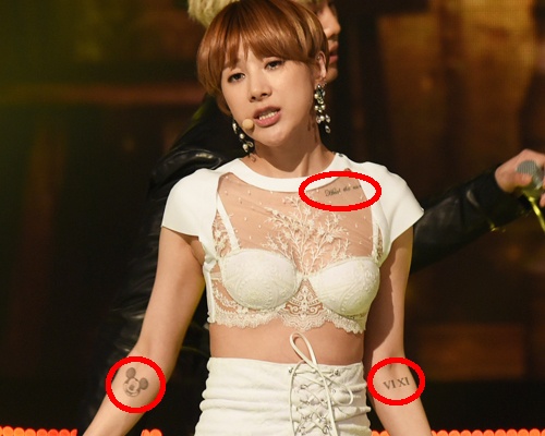 Seo In Young khoe loat hinh xam tren san khau hinh anh