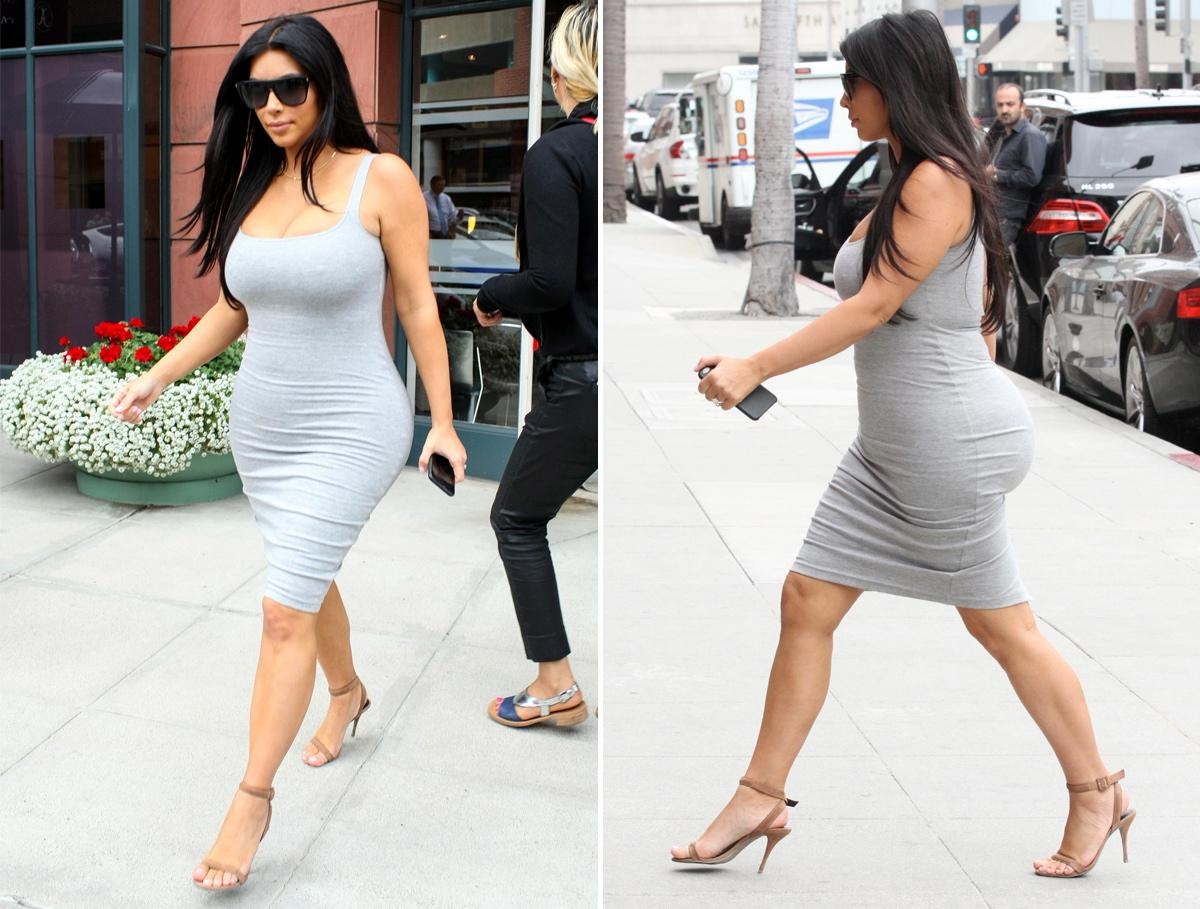 Kim đi mua sắm ở Beverly Hills hôm 12/6 trong chiếc váy 2 dây chất liệu cotton ôm trọn lấy cơ thể. Đặc biệt, bà bầu vẫn không mặc áo lót. Khi di chuyển, Kim suýt vấp ngã vì đi giày cao gót.