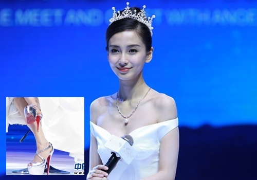 Angela Baby di giay cao got giua tin don mang bau hinh anh