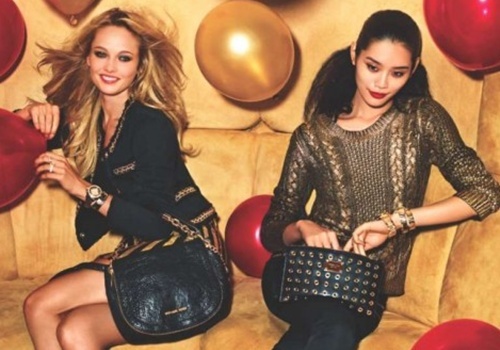 Tui xach Michael Kors, Kate Spade sap 'that sung' hinh anh