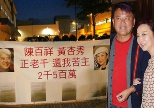 Vo chong Huynh Hanh Tu bi doi no giua pho hinh anh