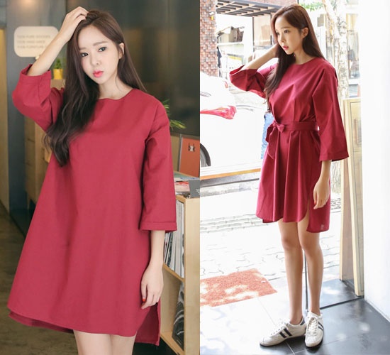 Chiếc váy liền thân dáng suông màu đỏ đun được yêu thích ngày thu se lạnh. Dáng váy này thêm ấn tượng đồng thời cố định được phần eo với chiếc thắt lưng cùng chất liệu to bản.