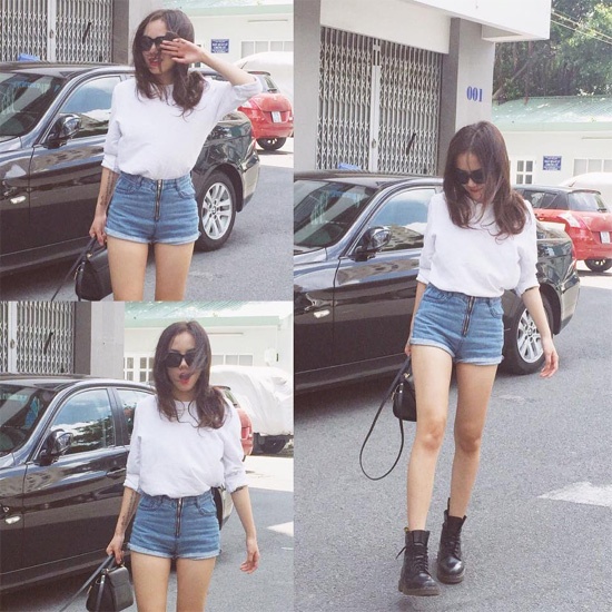 Áo trắng đơn giản, quần short jean, boot buộc giây là style năng động, khỏe khoắn được Phương Ly lựa chọn để dạo phố.