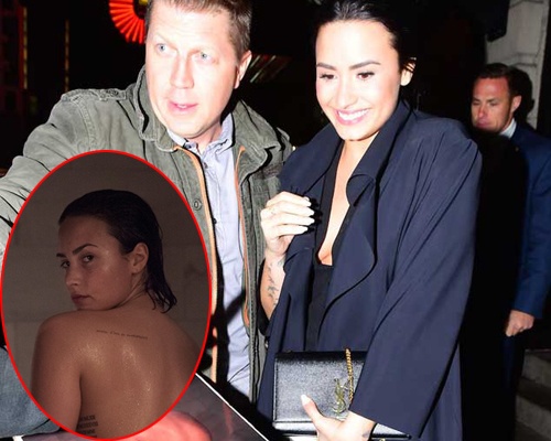 Demi Lovato tu choi fan ky ten vao anh nude hinh anh