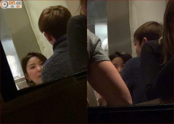 TOP trò chuyện với một phụ nữ xinh đẹp.