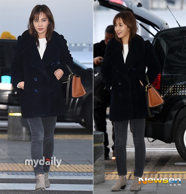 Thành viên Yuri dường như giản dị, đơn điệu nhất trong nhóm khi chỉ diện jeans tối màu, áo khoác đen có phần già dặn và đôi boots màu xám.