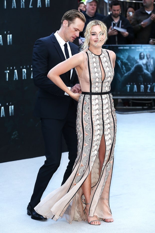 &lsquo;Tarzan&rsquo; giup nguoi dep tranh ho henh tren tham do anh 2