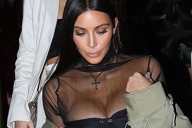 Kim Kardashian bị cướp ảnh 2 Kim Kardashian bi cuop anh 2