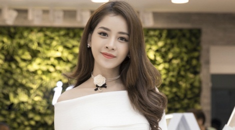 Chi Pu dien vay trang noi bat trong su kien hinh anh