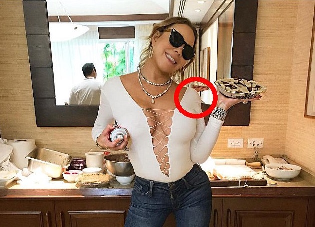 Mariah Carey bi nguoi ham mo to photoshop den meo cua hinh anh