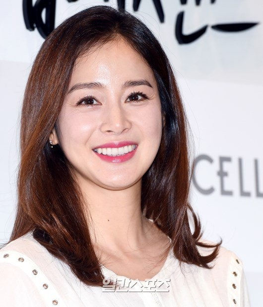 Kim Tae Hee dien ao rong giau bung bau anh 4