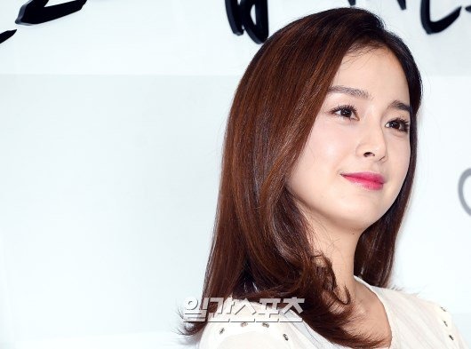 Kim Tae Hee dien ao rong giau bung bau anh 6