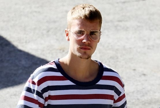 Justin Bieber xuong sac, mac ao co My chao mung quoc khanh hinh anh