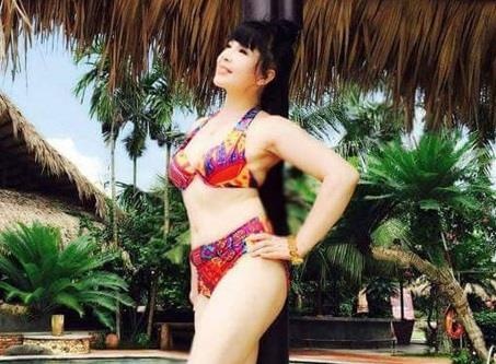 NSND Lan Huong dang anh dien bikini, phu nhan 'dao keo' vong mot hinh anh