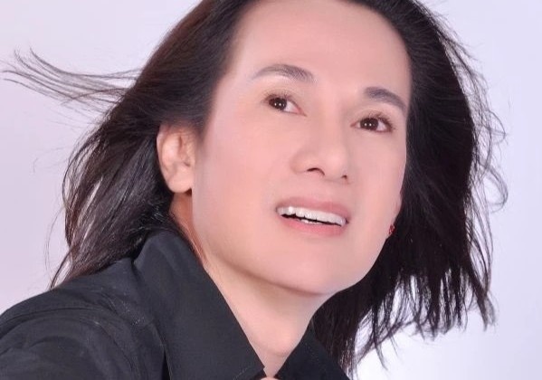 Ca si Ngo Quoc Linh qua doi hinh anh