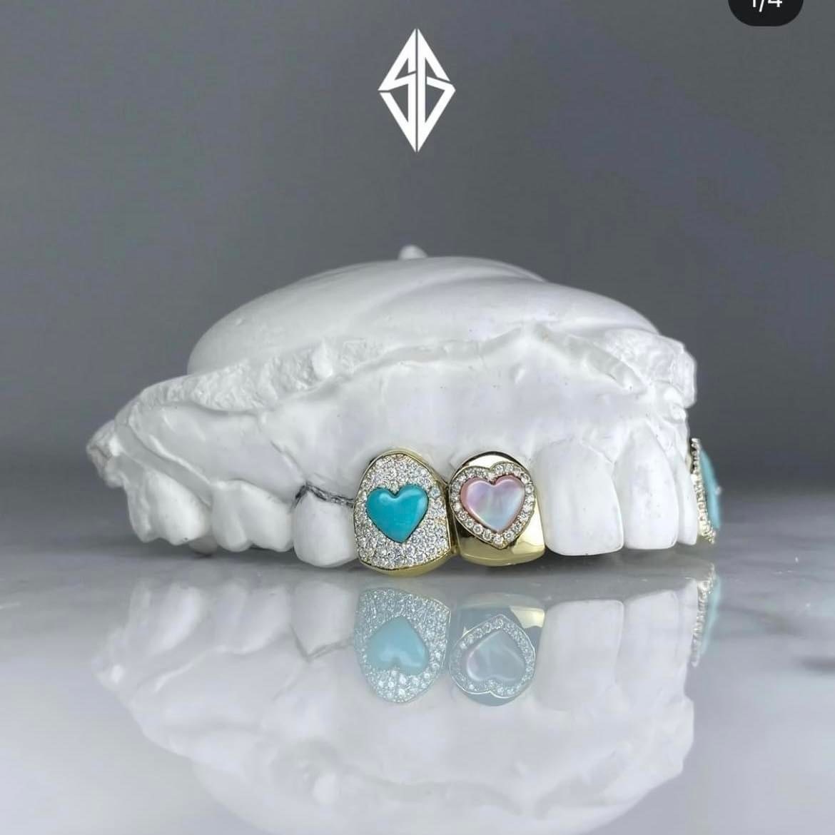 G-Dragon đính kim cương lên răng ảnh 2 G-Dragon dinh kim cuong len rang anh 2