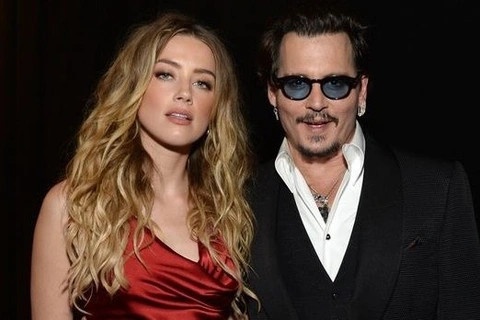 Johnny Depp noi ly do hai con khong du le cuoi cua cha voi Amber hinh anh