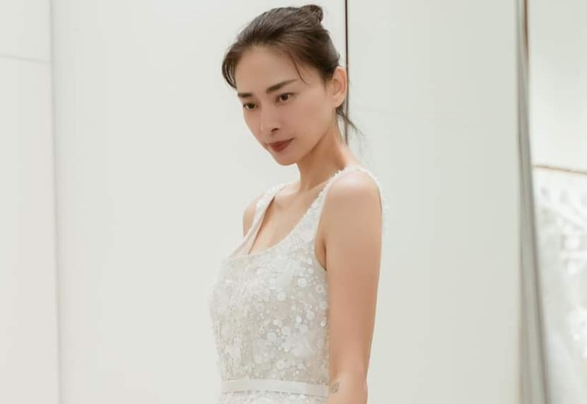 Ly do Ngo Thanh Van giu hinh xam, gan guoc va nep nhan tren anh cuoi hinh anh