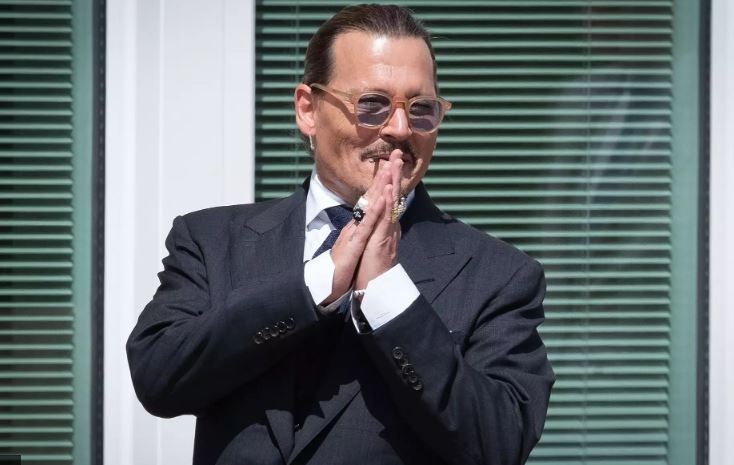 Amber Heard va Johnny Depp sau vu kien anh 1