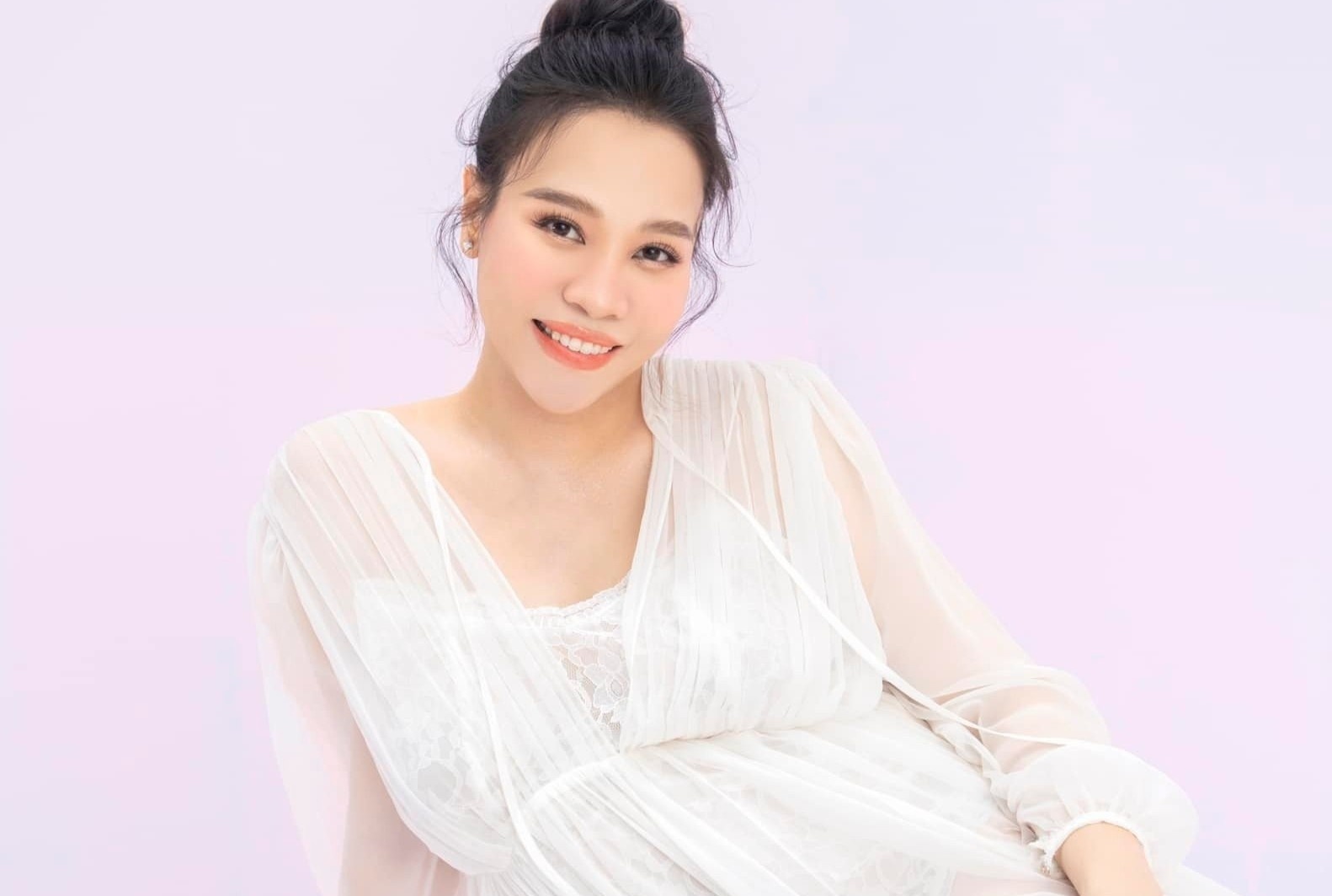 Dam Thu Trang co bau lan hai hinh anh