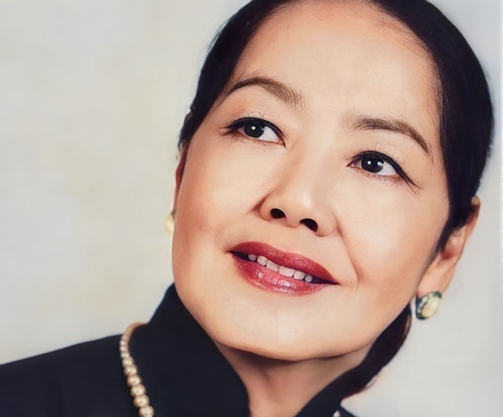 Nghe si Le Tham 'Mua len trau' qua doi hinh anh