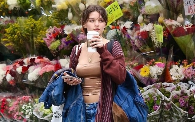 Suri Cruise don tuoi 18 hinh anh