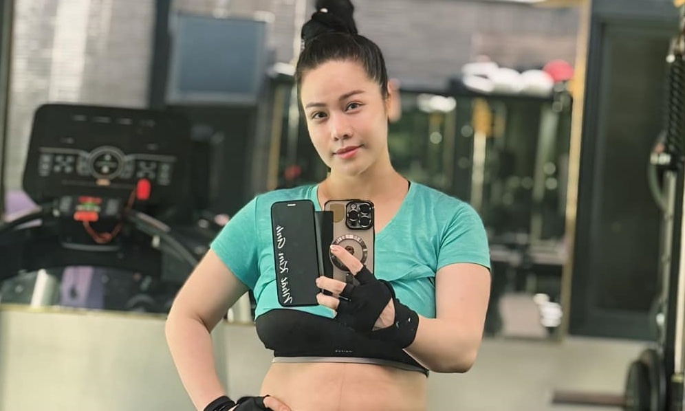 Nhat Kim Anh giam 18 kg sau sinh hinh anh