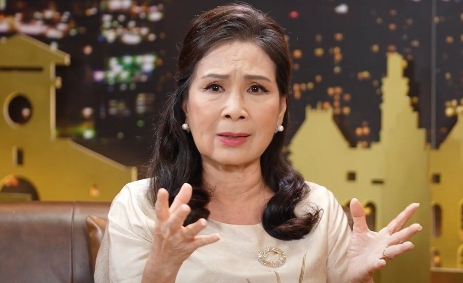 NSND Kim Xuan noi ve hinh anh 'guc dau, bat dong' o su kien hinh anh