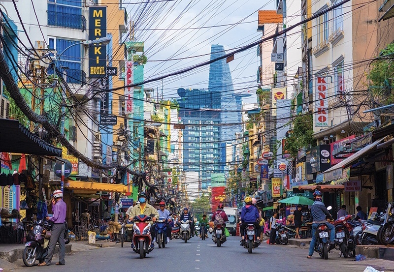 'Sai Gon rat giong New York, dong duc, di lai nhanh chong' hinh anh