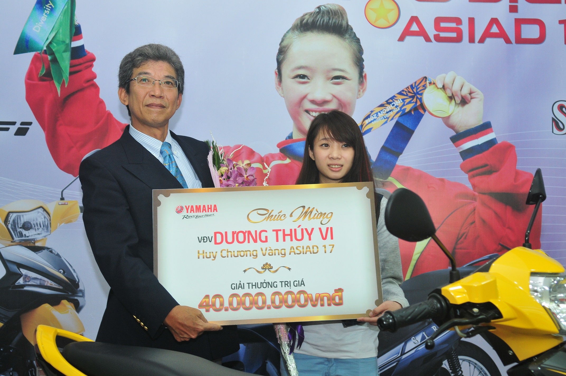 Duong Thuy Vi - vo dich ASIAD trong vai tro dai su Yamaha hinh anh