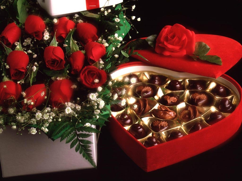 Hoa hồng và chocolate là những món quà truyền thống ngày Valentine. (Ảnh: freakify.com)