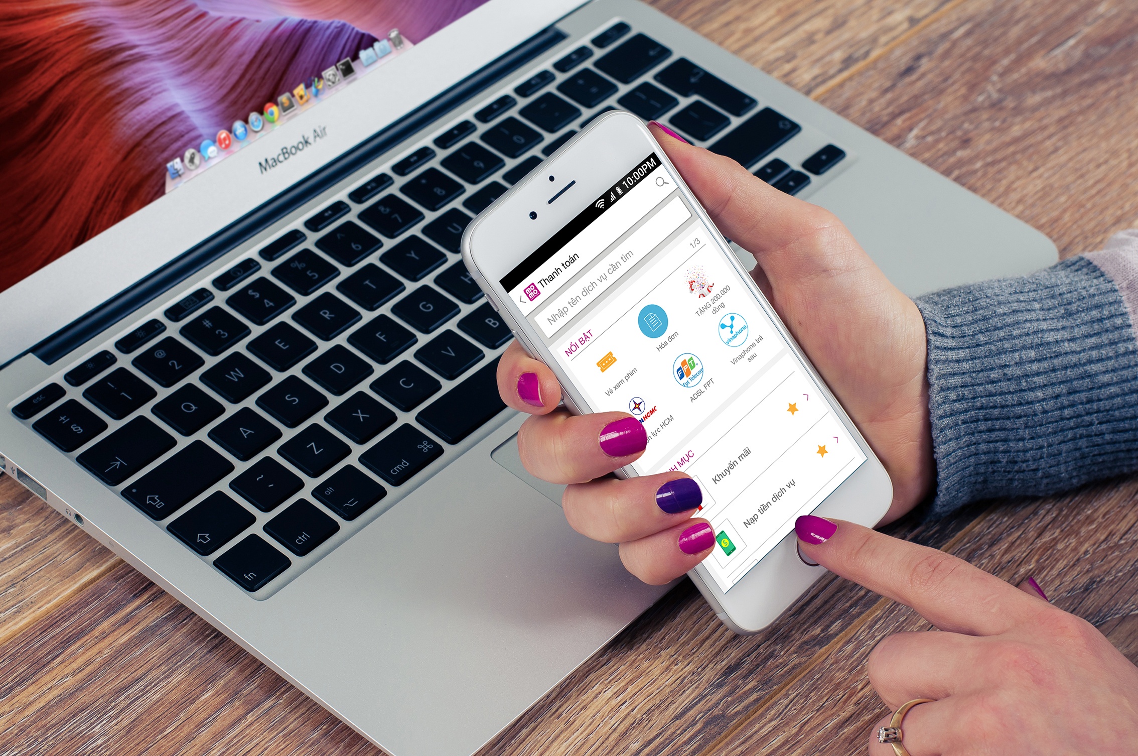 MoMo lot top 2 ung dung mien phi tren AppStore Viet Nam hinh anh