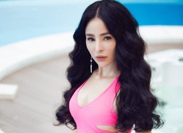 Hoa hau Ha My dien bikini khoe eo thon hinh anh