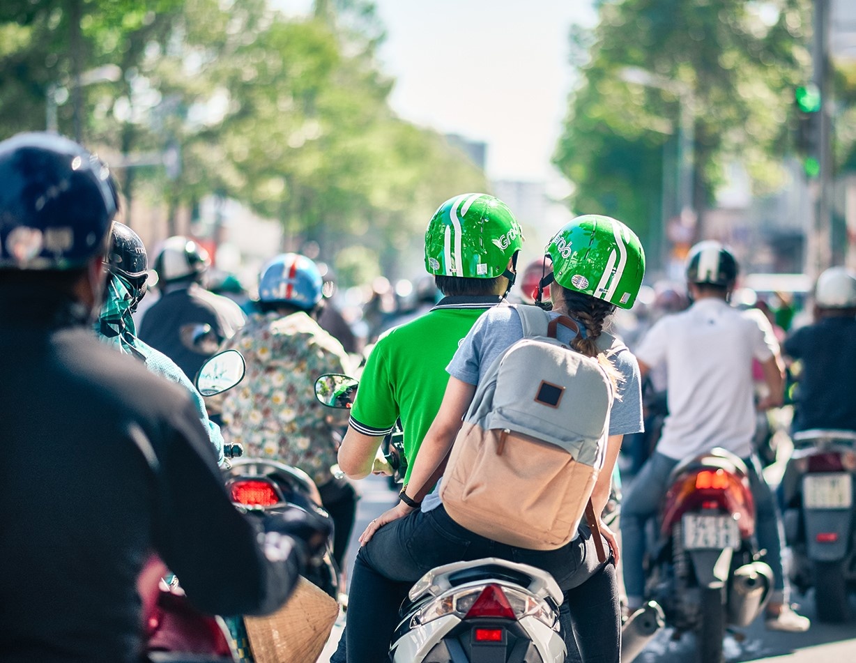 Grab mua bao hiem toi 800 trieu cho tai xe, hanh khach hinh anh