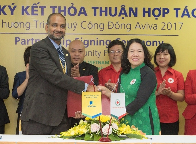 Aviva va T.U Hoi Chu thap do ky ket chuong trinh Quy cong dong Aviva hinh anh