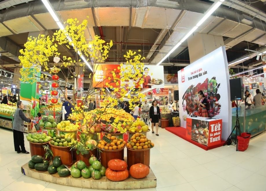 Vinmart ho tro dia diem ban hoa, cay canh Tet hinh anh