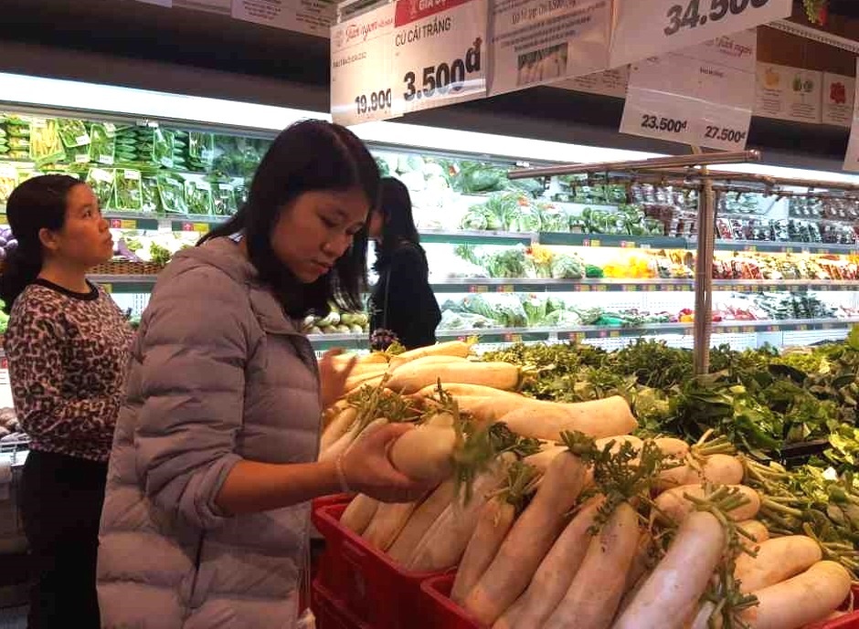Lotte Mart ho tro nong dan xa Trang Viet tieu thu cu cai trang hinh anh