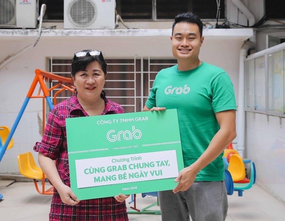 Grab chung tay nuoi duong tinh yeu cong nghe cho tre kem may man hinh anh