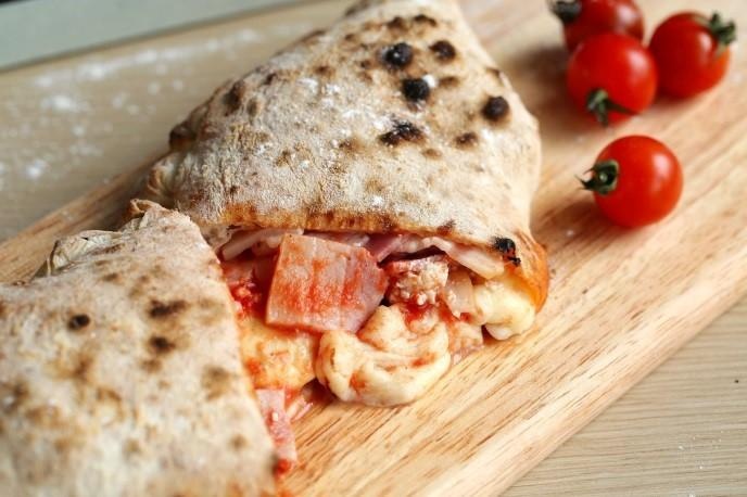 Nha hang pizza phong cach Nhat tung bung giam 25% dip khai truong hinh anh