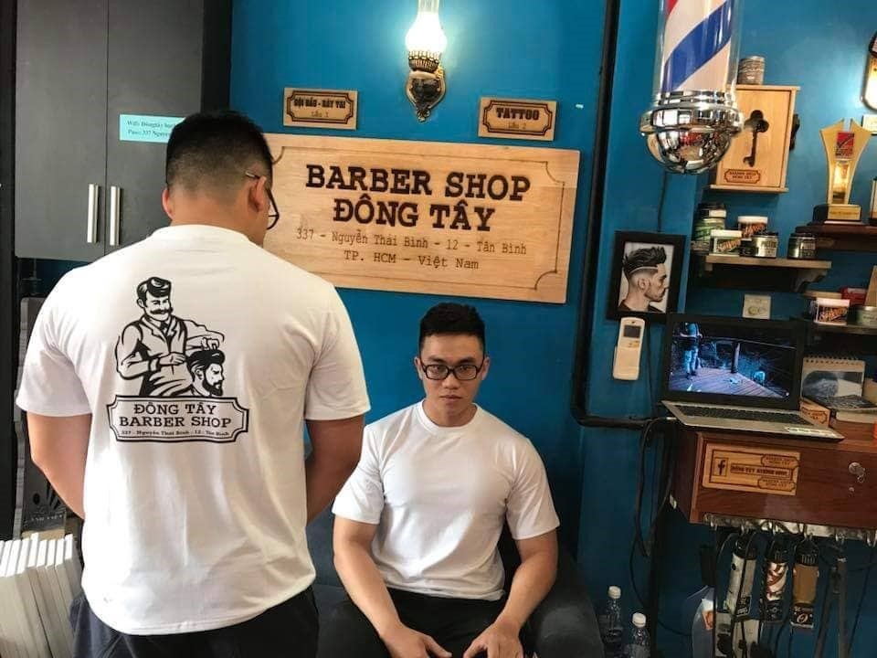 Dong Tay Barbershop cat toc mien phi cho nguoi lao dong ngheo hinh anh