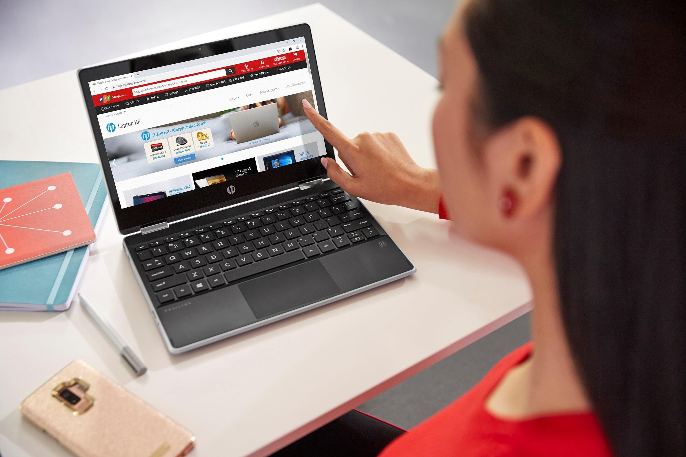 HP bat tay FPT Shop ra mat chuyen trang mua sam may tinh truc tuyen hinh anh