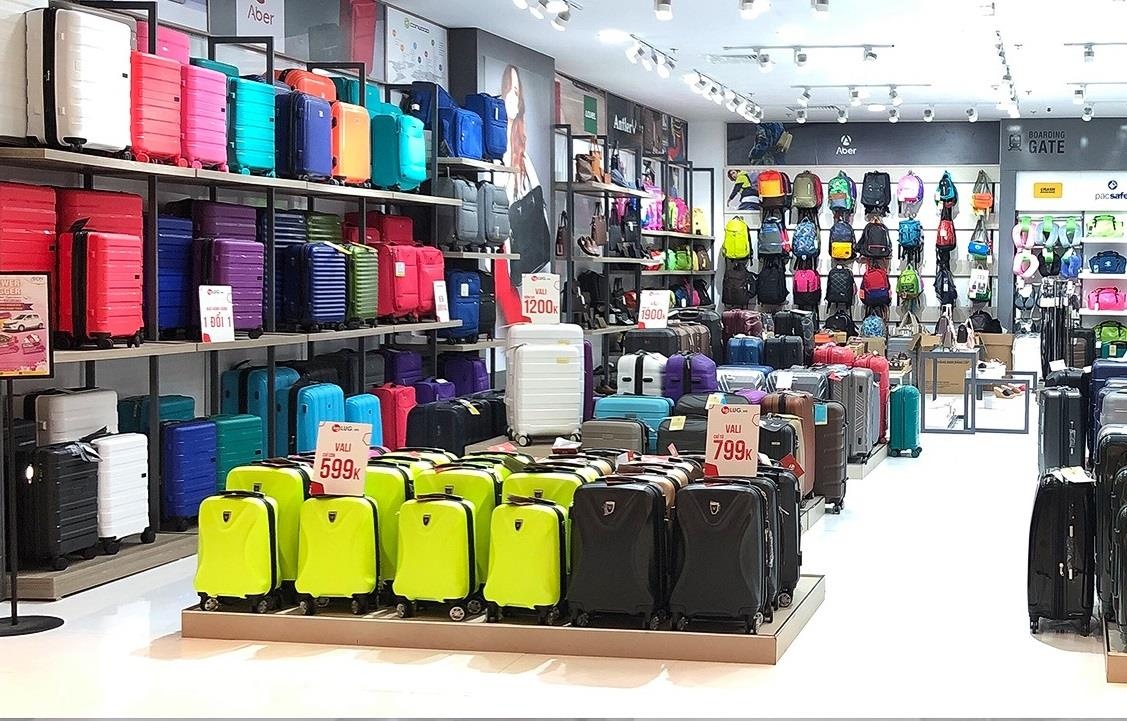 Chuoi ban le san pham hanh ly Lug danh dau cot moc mo 50 cua hang hinh anh